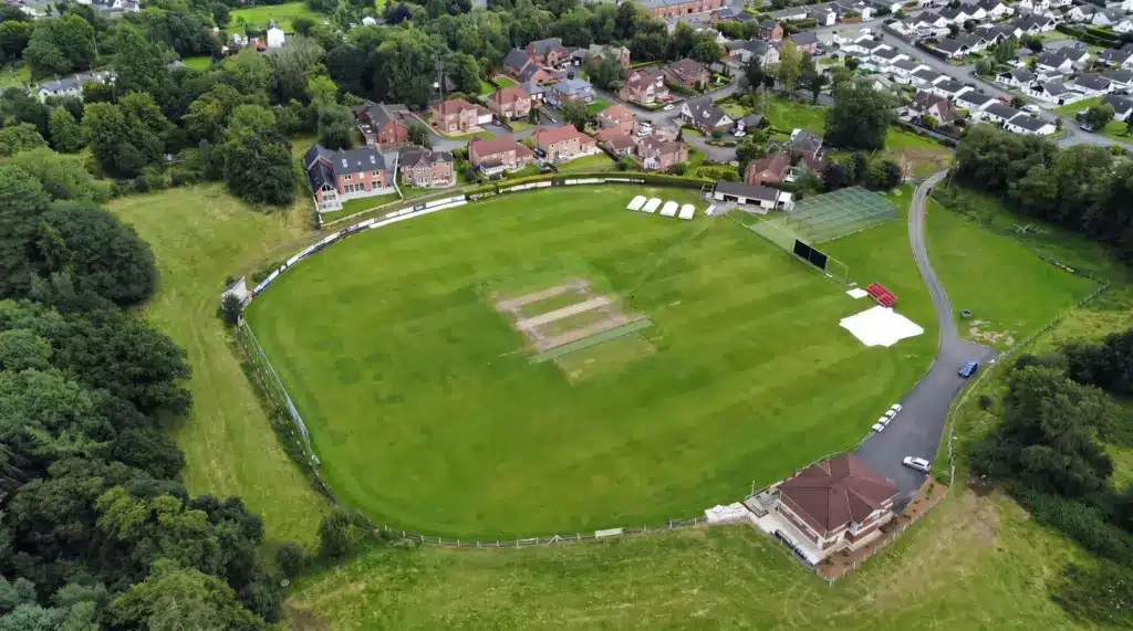 Aerial view of Waringstown Cricket Club ground and pavilion in Northern Ireland